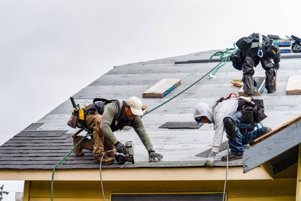 Professional Gutter Installation technician working in Rimforest, CA
